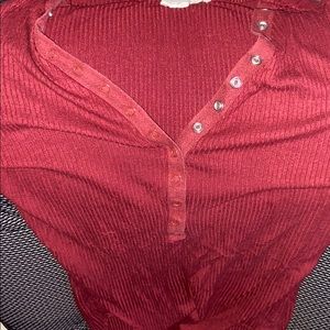maroon body suit